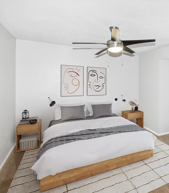 Model Bedroom with Carpet and Window View at Summit Ridge Apartments located in Arlington, TX-SMLAM.