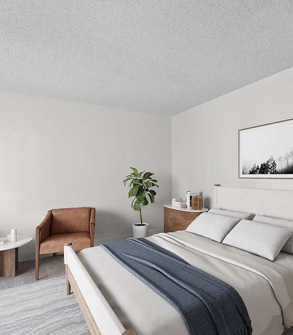 Model Bedroom with Carpet and Window View at Horizon Apartments located in Santa Ana, CA-SMLAM.