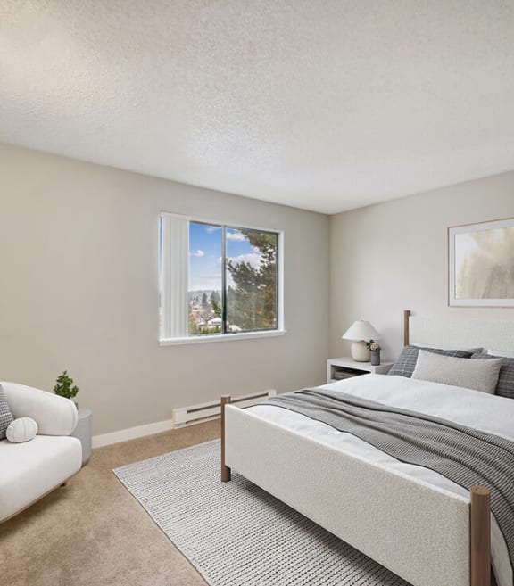 Model Bedroom with Carpet and Window View at Grammercy Apartments located in Renton, WA-SMLAM.