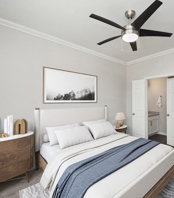 Model Bedroom with Carpet and attached Bathroom at Chapel Hill Apartments in Lewisville, TX-SMLAM.