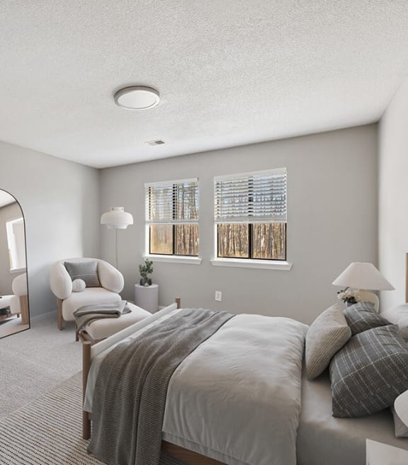 Model Bedroom with Carpet and Window View at Spring Forest Apartments in Raleigh, NC-SMLAM.