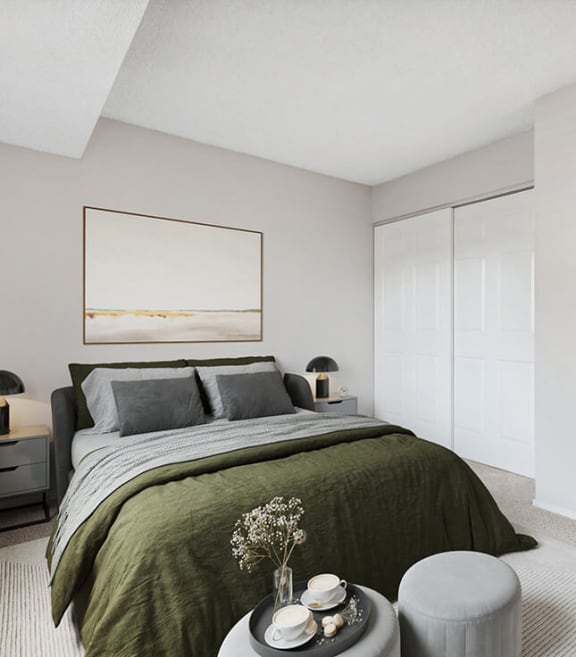 Model Bedroom with Carpet and attached Bathroom at Liberty Creek Apartments in Aurora, CO-SMLAM.