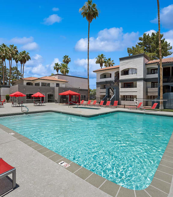 Community Swimming Pool with Pool Furniture at Country Club Verandas Apartments located in Mesa, AZ-SMLAM.