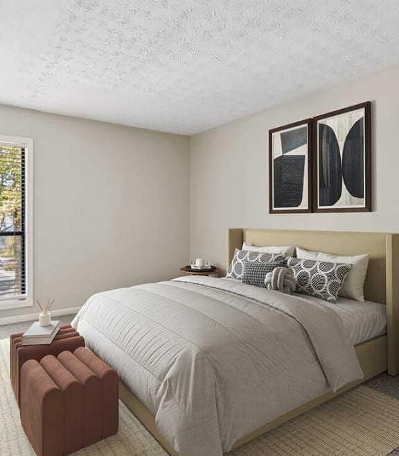 Model Bedroom with Carpet and Window View at Lakeside Retreat Apartments located in Peachtree Corners, GA-SMLAM.