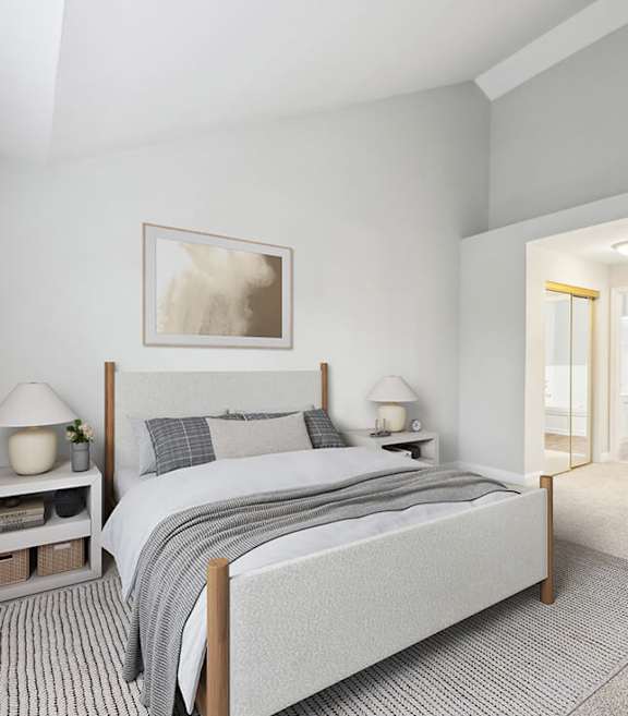 Model Bedroom with Carpet and attached Bathroom at Dulles Green Apartments located in Herndon, VA-SMLAM.