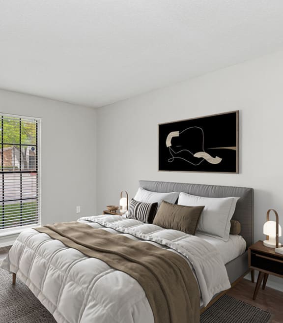 Model Bedroom with Wood-Style Flooring and Window View at Grand Pavilion Apartments in Tampa, FL-SMLAM.