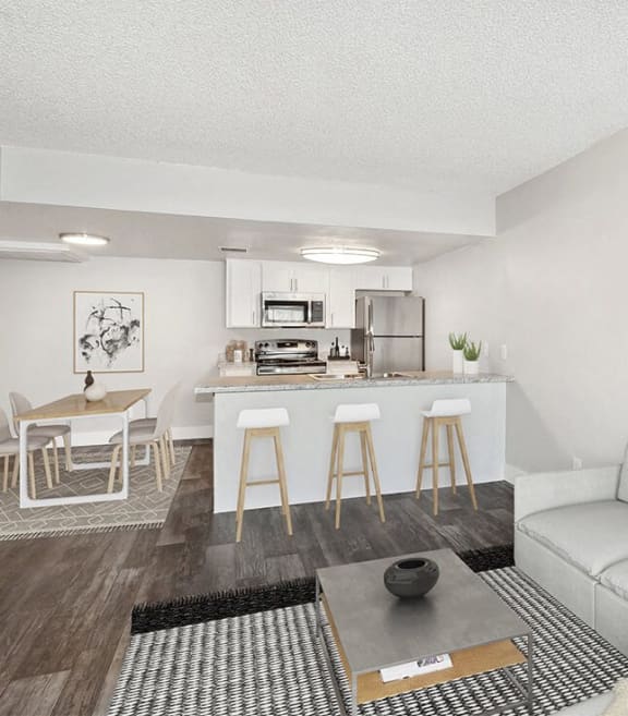 Model apartment living room, dining room and kitchen