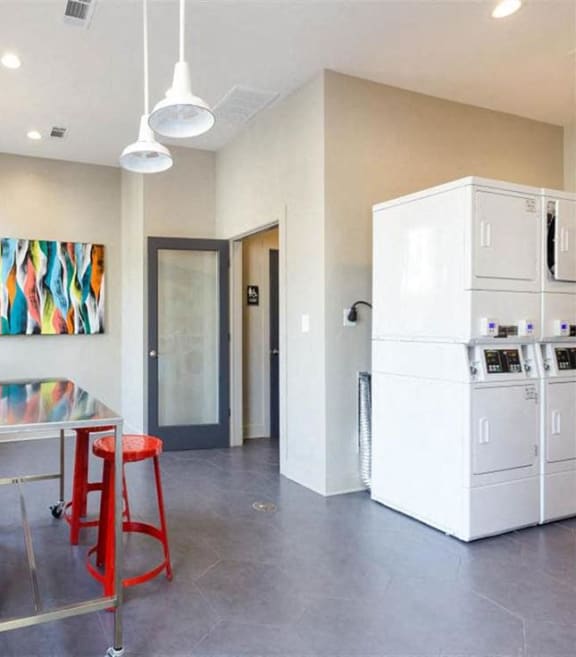 Laundry center at The Grandstand apartments