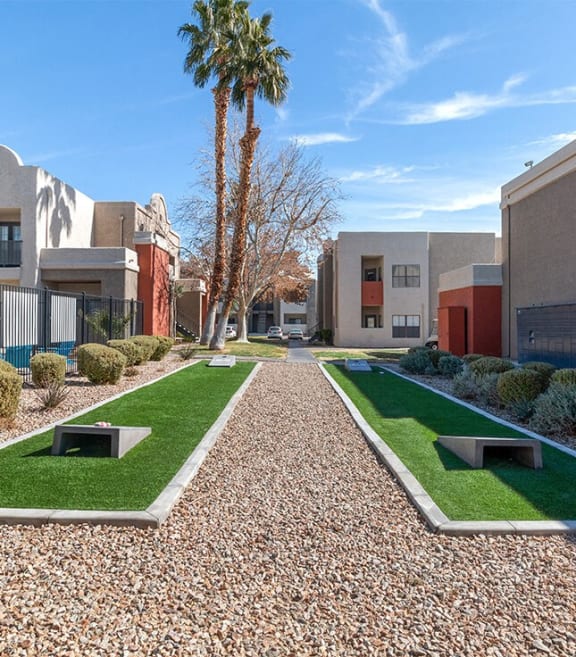Cornhole area at Helix apartments