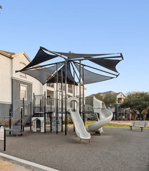 Community Playground at Park West Apartments located in Houston, TX-SMLAM.