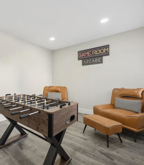 Community Clubhouse with Game Tables at Villages at Metro Center located in Phoenix, AZ-SMLAM.