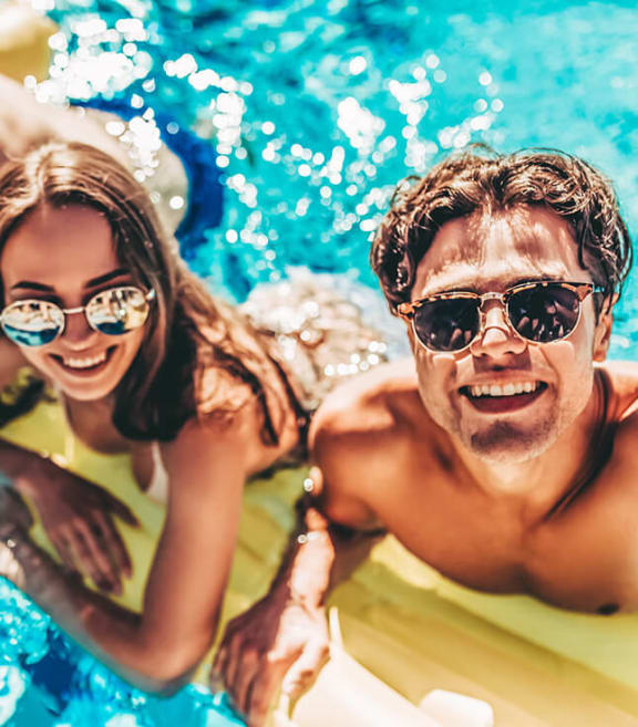 Stock Photo of Friends Swimming-SMLAM.