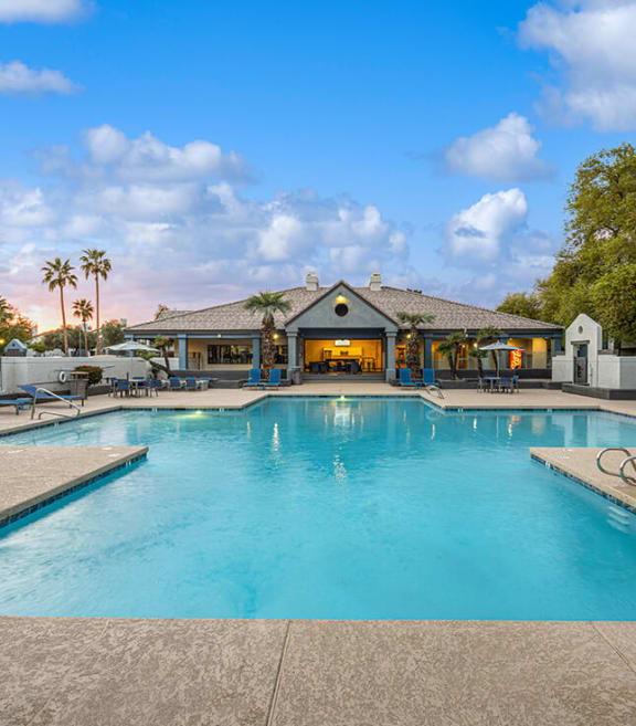 Community Swimming Pool with Pool Furniture at Array at South Mountain Apartments located in Ahwatukee, AZ-SMLAM.