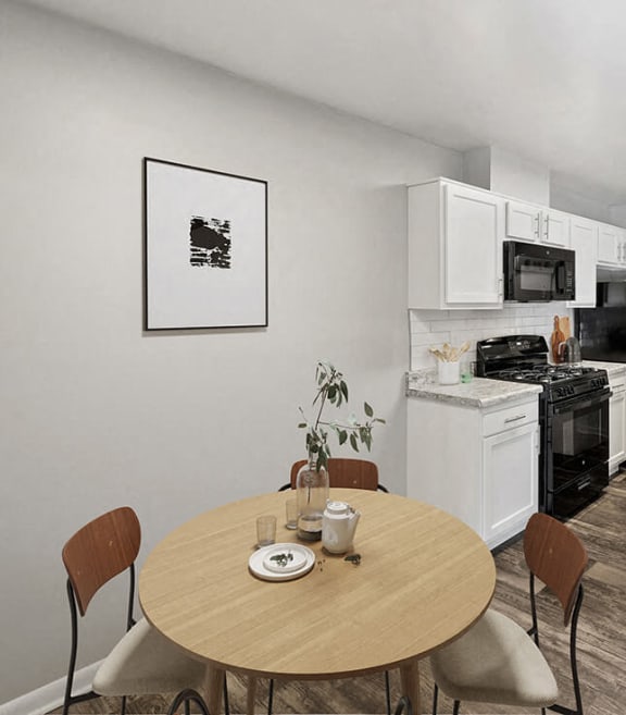 Model dining area at Dale Forest Apartments in Dale City, Virginia