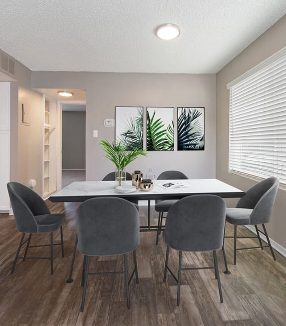 Model dining room at Bridges at 9 Mile Station Apartments in Denver, CO.