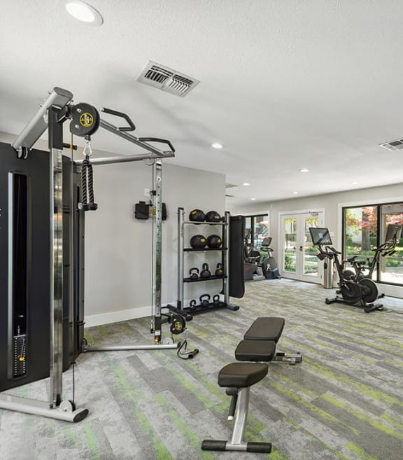 Fitness center at Bridges at Deer Run Apartments in Dallas, TX.
