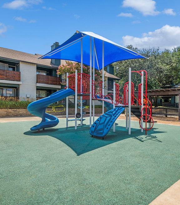 Playground at Bridges at Deer Run Apartments in Dallas, TX.