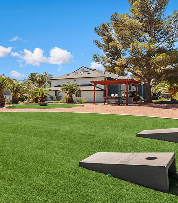 Community Corn Hole Area at Accent on Rainbow Apartments located in Las Vegas, Nevada.