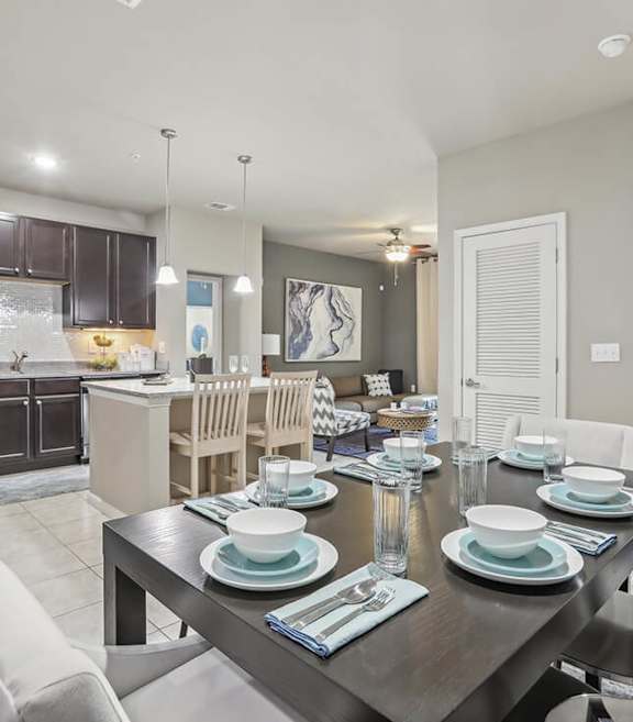 Model Dining Room & Kitchen at Bridges at Crosstown located in Tampa, Florida.