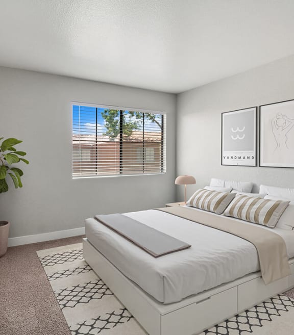 Model Bedroom with Carpet at Stonegate Apartments located in Las Vegas, NV-SMLAM.