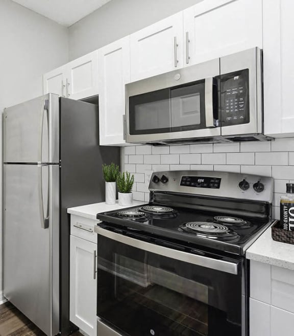 Model kitchen at The Vinings at Hunter's Green Apartments in Tampa, Florida