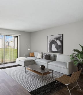 Model Living Room with Wood-Style Flooring at Parc at Creekside Apartments in Kansas City, MO-SMLAM.