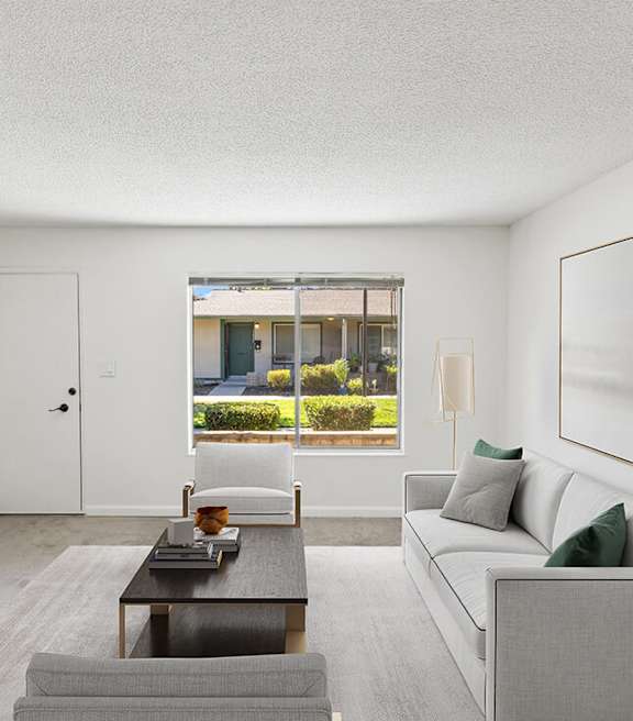 Model Living Room with Carpet and Window View at The Grove at Walnut Creek Apartments located in Walnut Creek, CA-SMLAM.