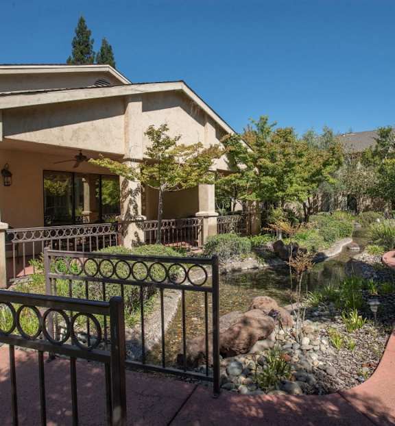 a house with a garden in front of it
