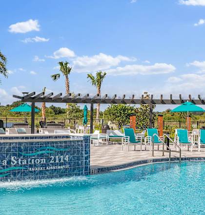 A pool with a sign that says "Integra Station 2114" on the side.