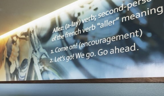 a large sign on the wall of a building