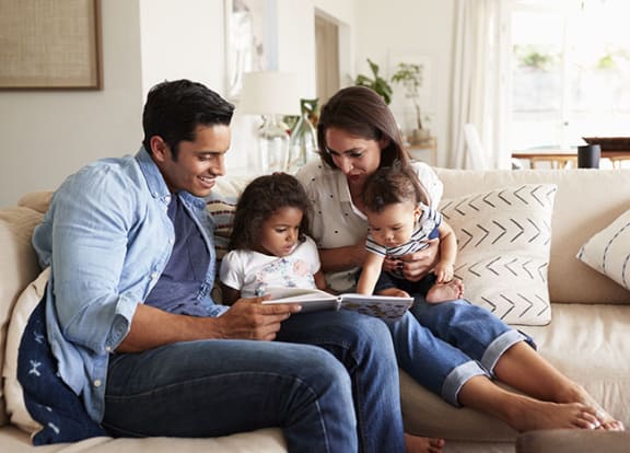 Lifestyle photo of family at home at Marbrisa Apartments, Miami Gardens