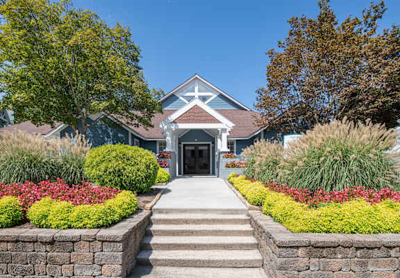 a house with a garden in front of it