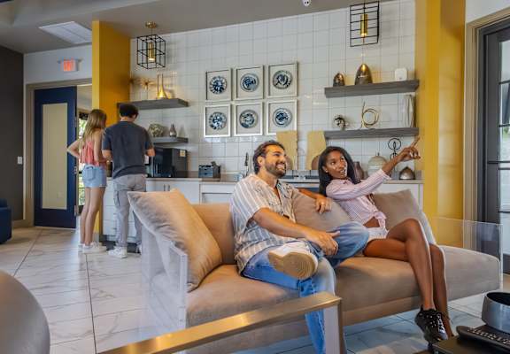 Couple sitting on couch at Portofino Vineyards, Fort Myers, FL, 33967