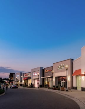 a shopping mall at night with a blue skyat The Slate, Jeffersonville, IN