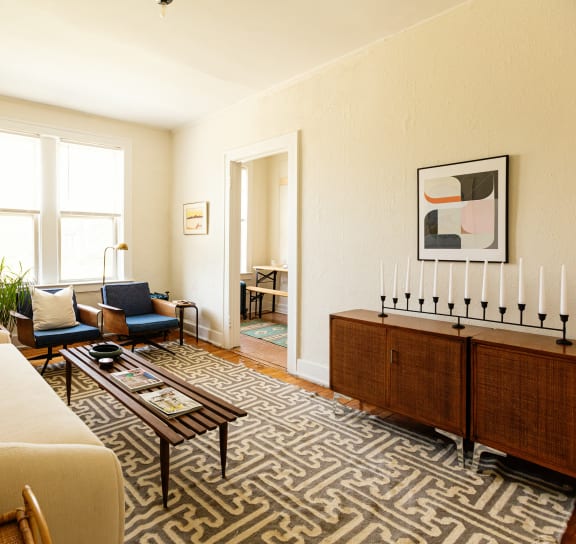 a bedroom with a bed and a door to a bathroom