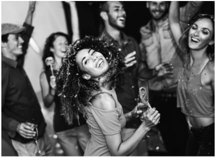 Friends Smiling and Dancing Together