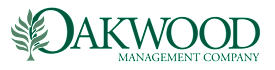 The image is a logo of a company named "Oakwood Management Company".