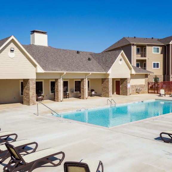 Parkside Apartments in Longview, Texas Pool with Lounge Chairs