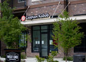 Thumbnail 7 of 14 - a brick building with a sign that reads cashman radio