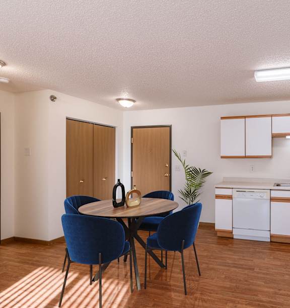 an empty kitchen with white appliances and wooden cabinets