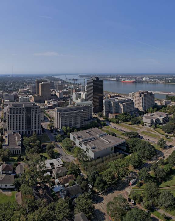 A cityscape with a large monument in the center.