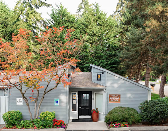 A small building with a sign that says "Office" on it.