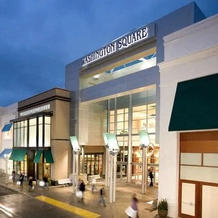 a rendering of a shopping center on a city street