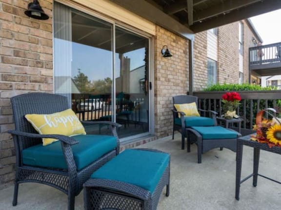 Spacious private apartment patio with model furnishings at The Onyx Hoover
