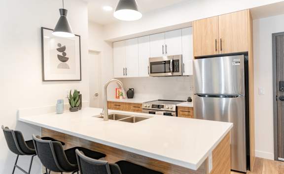 Living Area With TV at Vista Apartments at Edgemont, Alberta