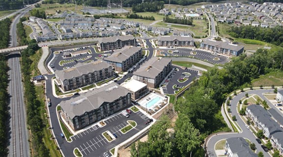 an aerial view of a large city with lots of houses