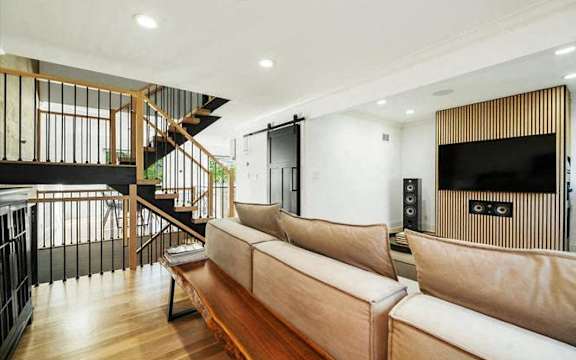a living room with a couch and a television