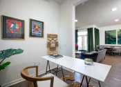 Thumbnail 17 of 19 - a home office with a white desk and two chairs