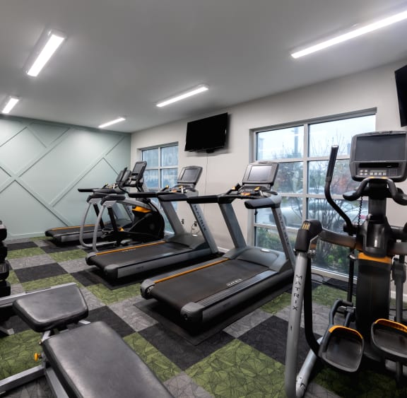 Fitness center at 310 at Nulu Apartments-Student, Louisville Kentucky