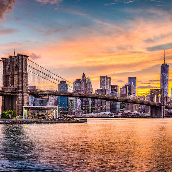 The Brooklyn Bridge spans the East River in New York City.